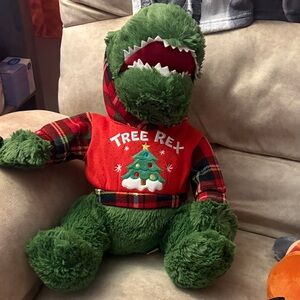 Festive Green Dinosaur Plush with Red Sweater